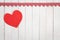 Valentines Day wooden heart on shiplap white boards with a checked ribbon across the top with room or space for copy, text or your