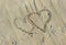 Valentines Drawn on Sandy Beach