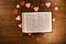 Valentines heart and bible on wooden table