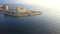 Valletta, Malta - 4K drone flying towards Sliema and TignÃ© Point at sunrise above Mediterranean Sea