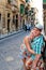 Valletta, Malta, August 2015. Happy mother and child on the old city street.