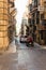 Valletta, Malta, August 2019. ATV and car on the old street of a medieval city.