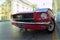 Valletta, Malta, August 2019. The front of a red vintage car, shot on a wide-angle lens.