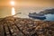 Valletta, Malta - Huge cruise ship entering the Grand Harbor of Valletta at sunset