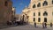 VALLETTA, MALTA - NOVEMBER 12, 2018 - Exterior view of the Auberge de Castille in Castille Square with people walking by