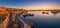 Valletta, Malta - Panoramic shot of an amazing summer sunrise at Valletta`s Grand Harbor with ships