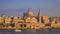 Valletta, Malta - Sailboat and the famous St.Paul`s Cathedral wi