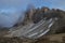 The valley below the Tre Cime mountain in the Italian Dolomites with an example of a narrow path around the mountains