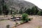 valley with clear water river mountains trees and sky huancavelica peru