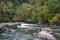 Valley Falls on the Tygart Valley River surrounded by greenery at daylight in West Virginia