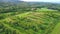 Valley with fields, meadows, agricultural farms, forests and houses