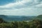 Valley with hills covered by lush forest