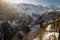 The valley of Lauterbrunnen viewed from the village of Murren in Switzerland on a sunny winter day. Panorama of swiss valley in