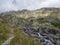 Valley Mlynska Dolina in slovakia mountains with Panoramic view on Strbske pleso village and mountain river stream, High Tatra