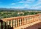 Valley with Mountain range and surrounding countryside, view from balcony with balustrade fence