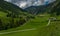 Valley near Kreealm waterfall in Austria Alps mountains on big wall