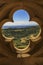 Valley seen in quatrefoil oculus of Iglesia de Santa Maria church in Ujue, Spain