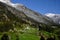 Valley and snowy mountains of Switzerland