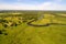 The valley of the Sorot river in the solar June morning aerial photography. Pushkinskie Gory, Russia