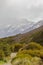 Valley in the Southern Alps among snow-capped mountains. Scenic trek to Hooker Lake. South Island, New Zealand