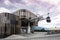 Valley station of modern ropeway with gondola with cloudy sky