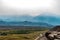 Valley view of Eastern Sierra Nevada mountains shroud in smoke of California forest fire