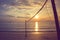 Valleyball net on the beach with beautiful seasacpe view and sunset light in twilight time at Chao Lao Beach.