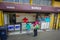 VALPARAISO, CHILE - SEPTEMBER, 15, 2018: Outdoor view of unidentified woman with her daugher at the enter of public