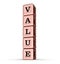 Value Word Sign. Vertical Stack of Rose Gold Metallic Toy Blocks