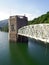 Valve Tower and Steel Bridge in Reservoir