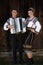 Vama, Romania, September 28th, 2019, Portraiture of young man playing the accordion wearing traditional  in Bucovina