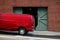 Van in Front of Warehouse Doors