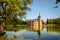 Van Horst Castle and its reflection in the lake, Belgium