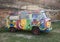 Van with psychedelic 1960s era paint job welcoming visitors to historic Jefferson City, Texas.