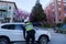 VANCOUVER, BC, CANADA - APR 20, 2019: A Vancouver Traffic Authority officer providing assistance to a motorist.