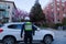 VANCOUVER, BC, CANADA - APR 20, 2019: A Vancouver Traffic Authority officer providing assistance to a motorist.