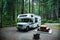 Vancouver Island, Canada, 20 august, 2019 // :Old Tioga caravan parked in a camping area in typical British Columbia camping