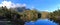 Vancouver Island Landscape Panorama of Mackenzie Range Reflected in Larry Lake, British Columbia, Canada