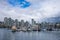 Vancouver marina, Vancouver buildings skyline in the background.