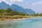 Vang Vieng, Laos - February 17, 2017: Tourists kayaking at Nam