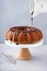 Vanilla bundt cake with chocolate glaze