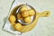 Vanilla Caramel Nuts Muffins In Paper Cups on cutting board