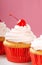 Vanilla cupcake with maraschino frosting