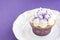 Vanilla Cupcake with Purple Background