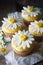 Vanilla cupcakes decorated with chamomile. Generative AI