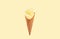 Vanilla ice cream cone on yellow faded pastel color background.