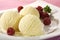 Vanilla icecream and raspberries