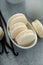 Vanilla macarons in a little bowl