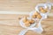 Vanilla meringue cookies on wooden background with copy space.