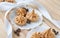 Vanilla meringue cookies on wooden background with copy space.